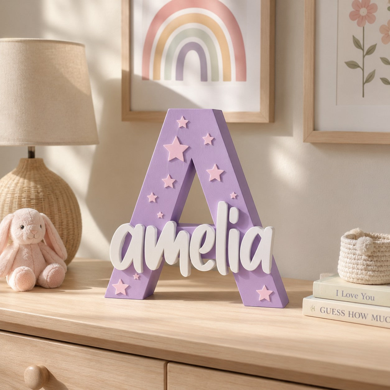 Stone Look Statues purple letter A nursery decor with white Amelia name and star accents on a wooden dresser.